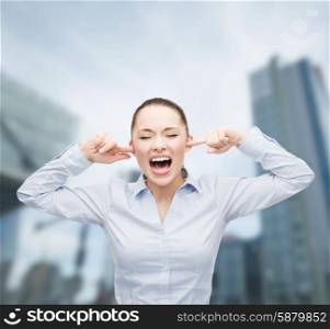 business, office and stress concept - angry screaming businesswoman outdoors