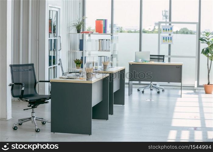 Business office people maintain social distancing meeting room. Stop covid-19 coronavirus.Social and business distancing new normal lifestyle.
