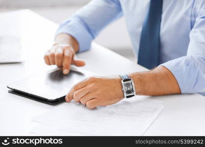 business, office, school and education concept - businessman with tablet pc in office