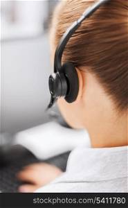 business, office, school and education concept - female helpline operator with headphones