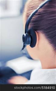 business, office, school and education concept - female helpline operator with headphones. female helpline operator
