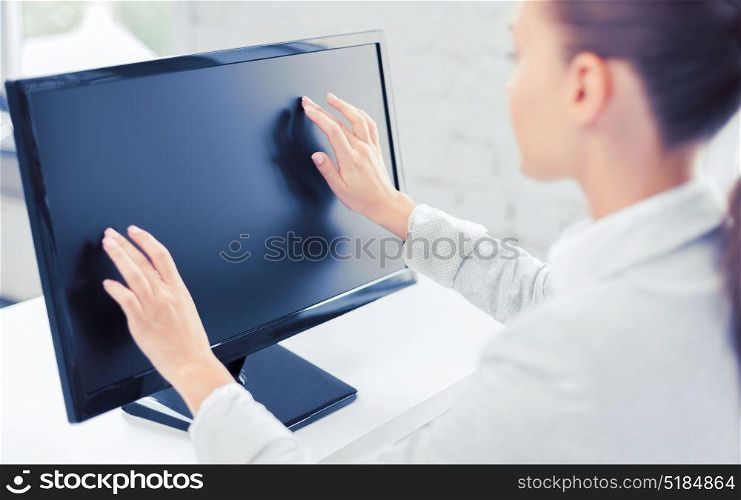 business, office, school and education concept - smiling businesswoman with touchscreen in office. smiling businesswoman with touchscreen in office