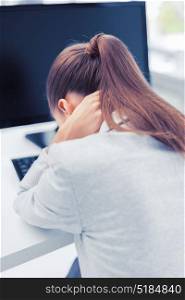 business, office, school and education concept - stressed businesswoman with computer at work. stressed woman with computer