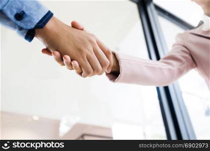 business partner hands shaking about agreement license