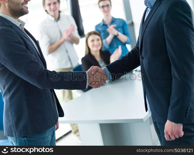 Business Partner Shake Hands on meetinig in modern office building