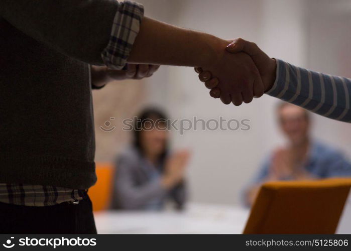 Business Partner Shake Hands on meetinig in modern office building