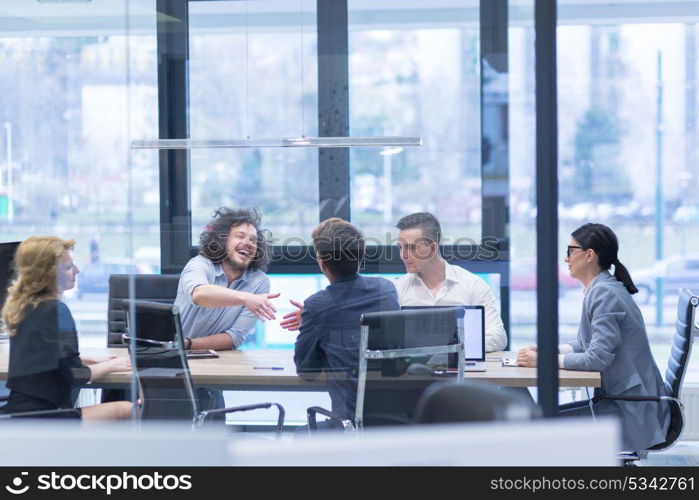 Business Partner Shake Hands on meetinig in modern office building