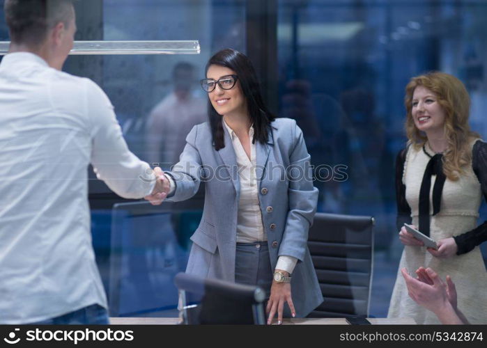 Business Partner Shake Hands on meetinig in modern office building