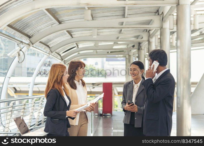 Business Partner using laptop online meeting team Partnership businessman, businesswoman talking together. Diversity Asian Business Partner online meeting trust teamwork. Asian Business team meeting.