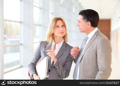 Business partners meeting in modern building