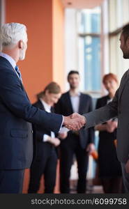business partners, partnership concept with two businessman handshake