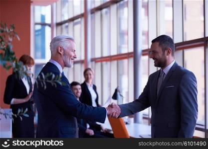 business partners, partnership concept with two businessman handshake