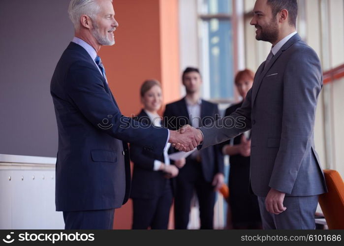 business partners, partnership concept with two businessman handshake