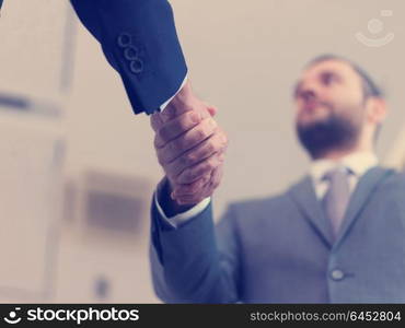 business partners, partnership concept with two businessman handshake