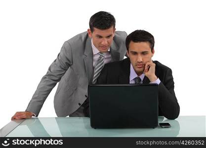 Business partners reading an e-mail together