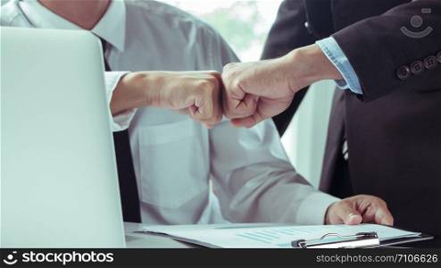 Business Partners Trust,two businessmen fist.after agreeing to work together.