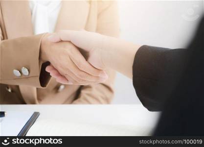 business partnership shaking hands agreement deal