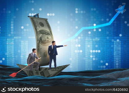 Business partnership with businessmen sailing on dollar boat