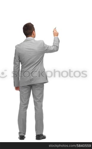business, people, advertisement , information and office concept - businessman writing or drawing something imaginary from back