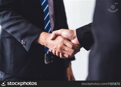 Business people agreement concept. Businessman do handshake with another businessman in the office meeting room.
