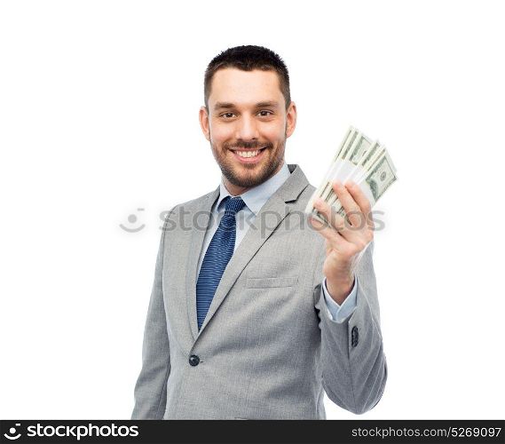 business, people and finances concept - smiling businessman with american dollar money. smiling businessman with american dollar money