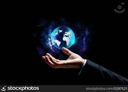 business, people and future concept - close up of businessman hand with earth globe projection over space background. close up of businessman hand with earth projection