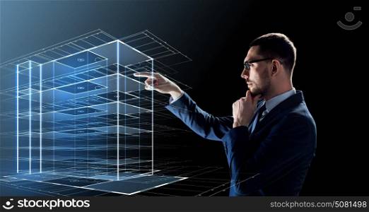 business, people and future technology concept - businessman in glasses with virtual construction hologram over black background. businessman in glasses with virtual building