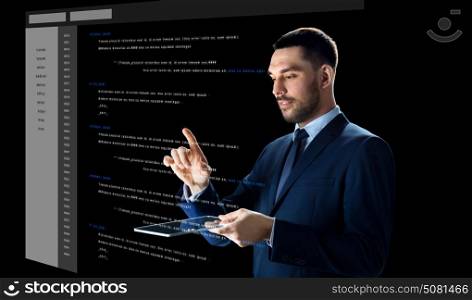 business, people and future technology concept - businessman in suit working with transparent tablet pc computer and coding on virtual screen over black background. businessman with tablet pc and virtual coding