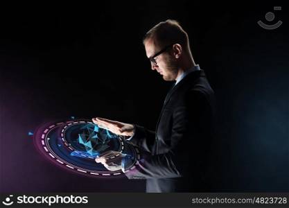 business, people and future technology concept - close up of businessman with transparent tablet pc computer and virtual polygonal projection over dark background
