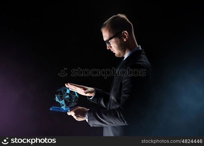 business, people and future technology concept - close up of businessman with transparent tablet pc computer and virtual polygonal projection over dark background