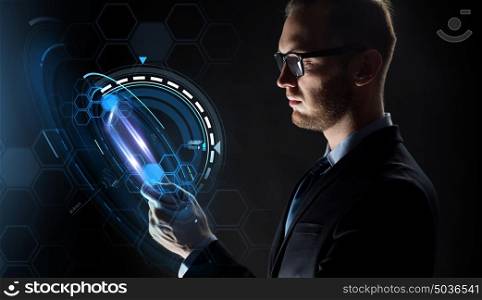 business, people and future technology concept - close up of businessman with transparent tablet pc computer and virtual projection over black background. close up of businessman with transparent tablet pc