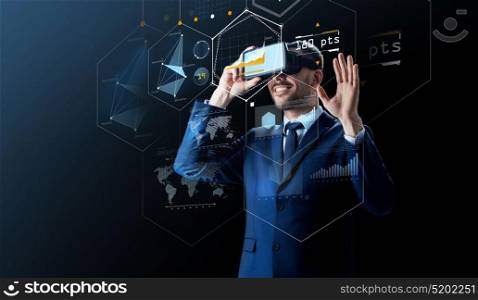 business, people and future technology concept - smiling businessman in headset over black background with virtual screens. businessman in virtual reality headset over black