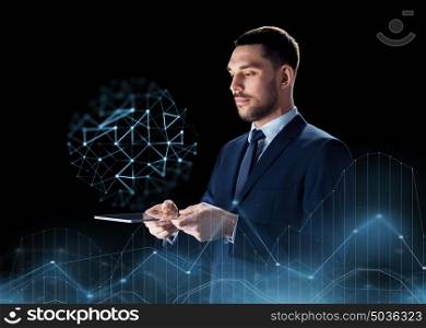 business, people and modern technology concept - businessman in suit working with transparent tablet pc computer over black background and low poly projection. businessman with transparent tablet pc
