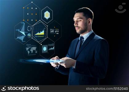 business, people and modern technology concept - businessman in suit working with transparent tablet pc computer and virtual projection over black background. businessman with tablet pc and virtual projection