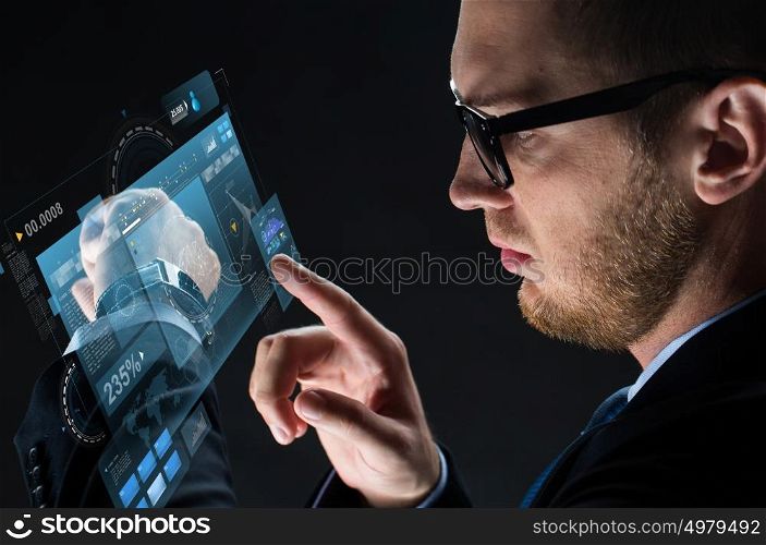business, people and modern technology concept - close up of businessman with smartwatch and virtual screen projection over black background. close up of businessman with smartwatch