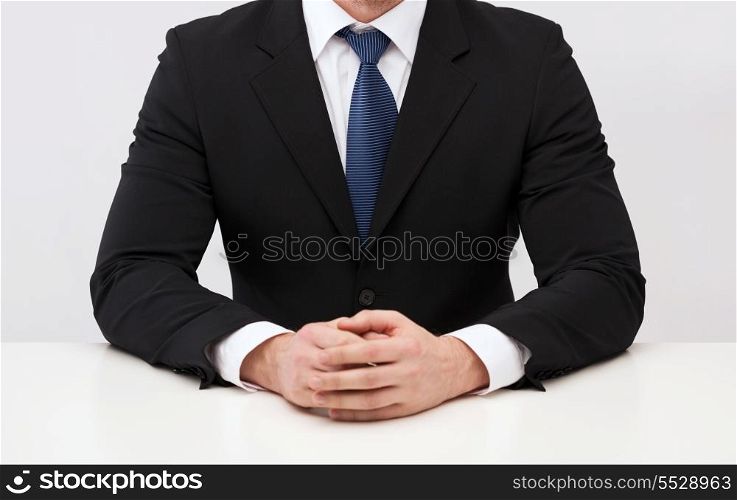 business people and office concept - close up of buisnessman in suit and tie