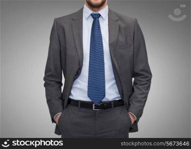 business, people and office concept - close up of businessman over gray background