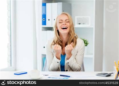 business, people and success concept - happy businesswoman celebrating triumph at office