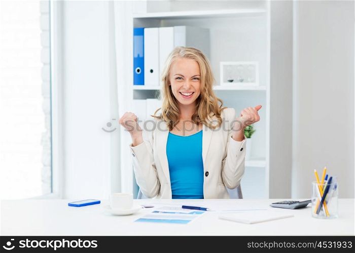 business, people and success concept - happy businesswoman celebrating triumph at office
