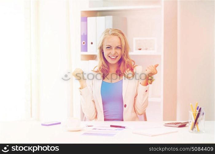 business, people and success concept - happy businesswoman celebrating triumph at office. happy businesswoman celebrating success at office. happy businesswoman celebrating success at office