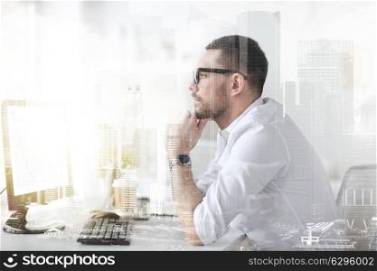 business, people and technology concept - businessman in glasses sitting at office computer and thinking with double exposure effect. businessman in glasses sitting at office computer