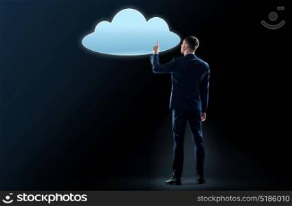 business, people and technology concept - businessman in suit touching virtual cloud hologram over black background. businessman touching virtual cloud hologram