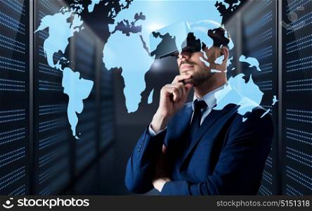 business, people and technology concept - businessman in virtual reality headset with world map projection over futuristic server room background. man in virtual reality headset with world map