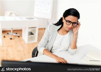 business, people and technology concept - businesswoman with computer working at office. businesswoman with computer working at office