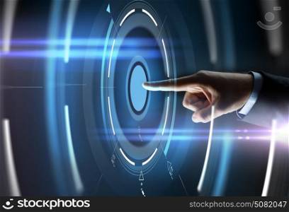business, people and technology concept - close up of businessman hand pointing finger to virtual projection over black background. male hand pointing finger to virtual projection