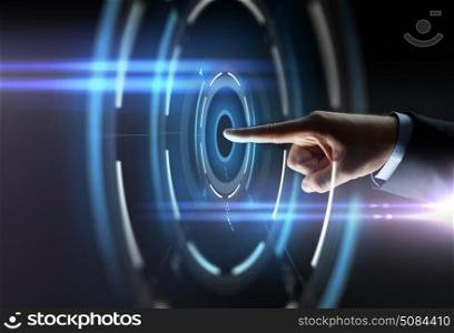 business, people and technology concept - close up of businessman hand pointing finger to virtual projection over black background. male hand pointing finger to virtual projection. male hand pointing finger to virtual projection