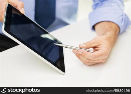 business, people and technology concept - close up of businessman hands with tablet pc computer pointing pen to blank screen at office