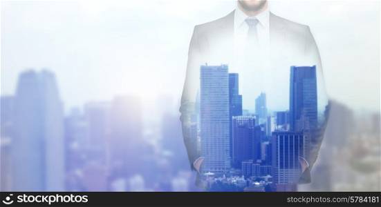 business, people and technology concept - close up of businessman over city background