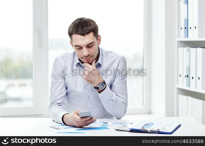business, people and technology concept - close up of businessman with smartphone