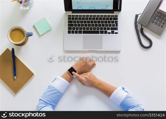 business, people and technology concept - hands of businesswoman with laptop computer working at office. hands of businesswoman working on laptop at office